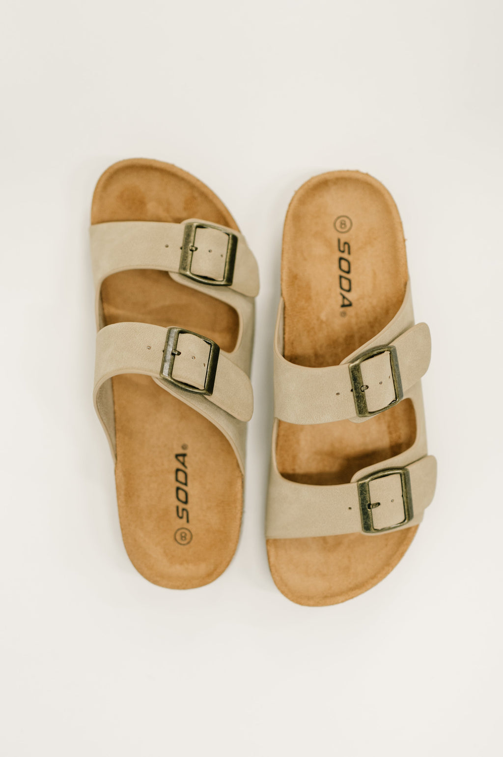 The Neutral Ground Buckle Slides